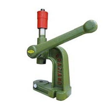 Máquina de fixação (prensa) manual de bancada, para aplicação 
de botões, ilhoses, rebites, colchetes e enfeites de metal. Alavanca de 
aplicação por torção. 